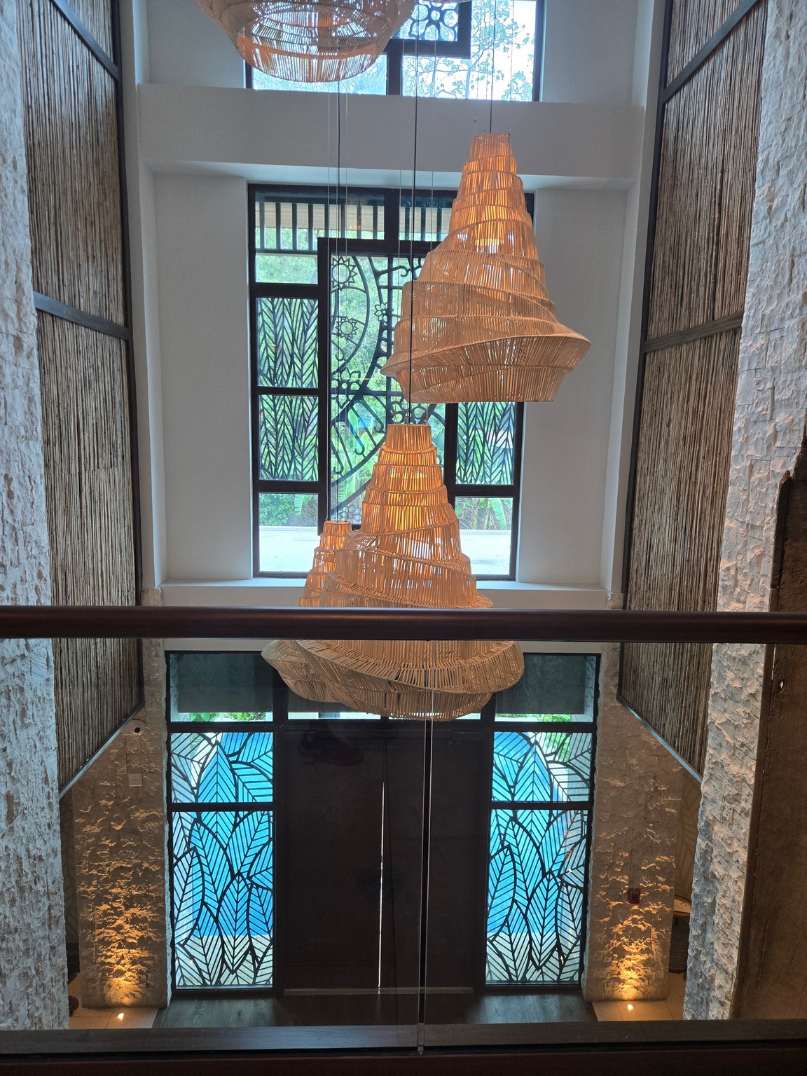 a chandelier from a railing in a room