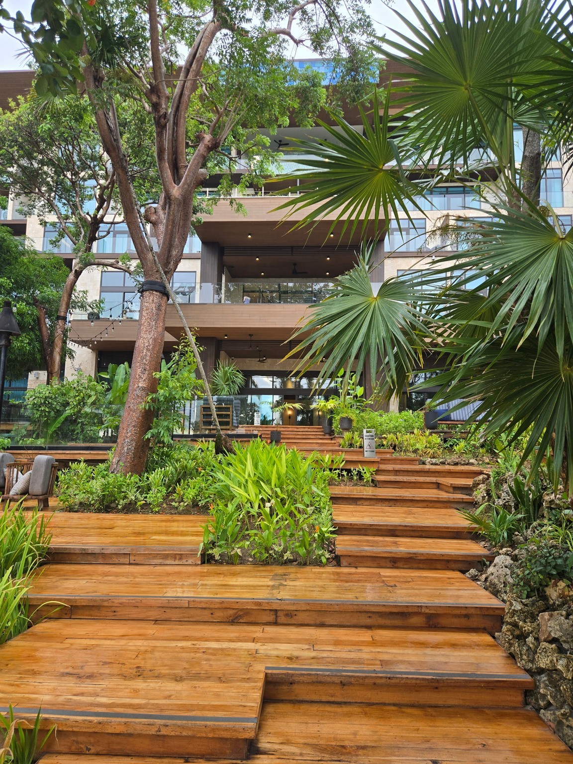 a wooden stairs leading to a building