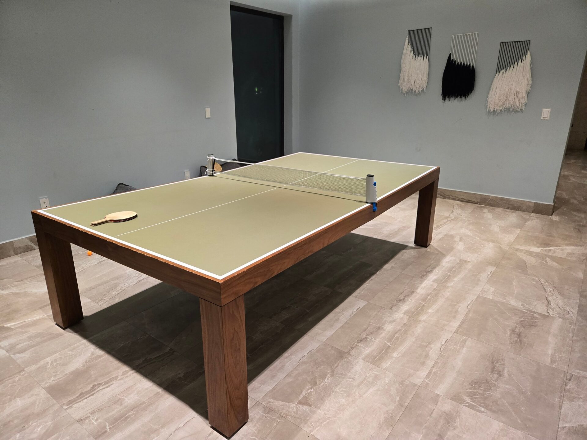 a ping pong table in a room