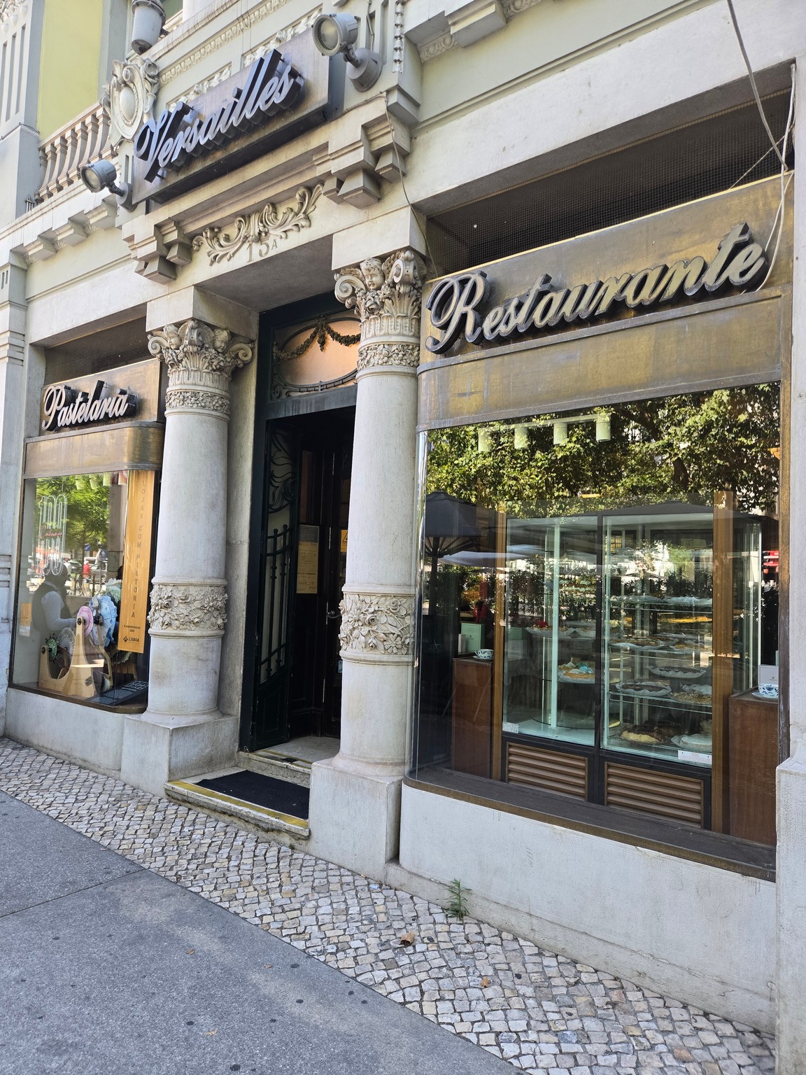 a building with columns and signs
