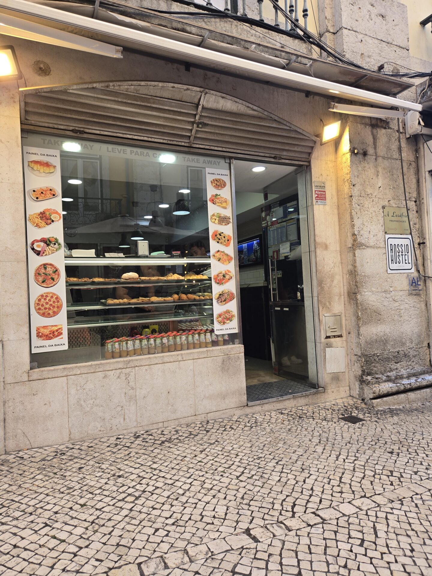 a store front with a sign on the window