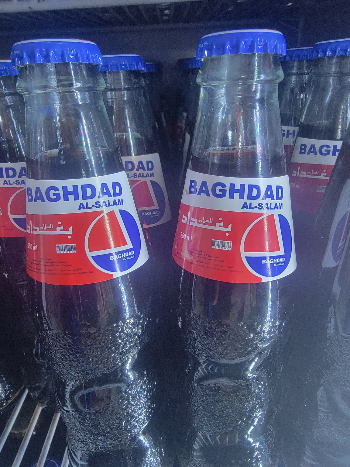 a group of bottles with labels