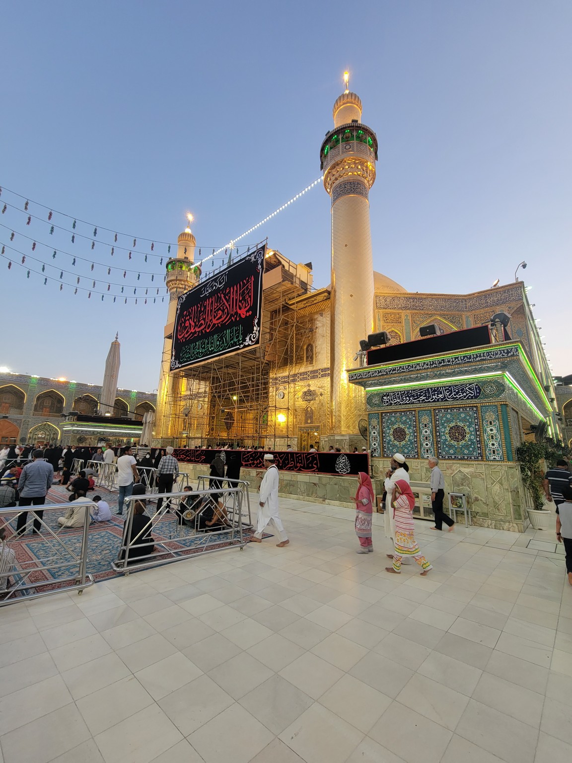 a group of people outside a building