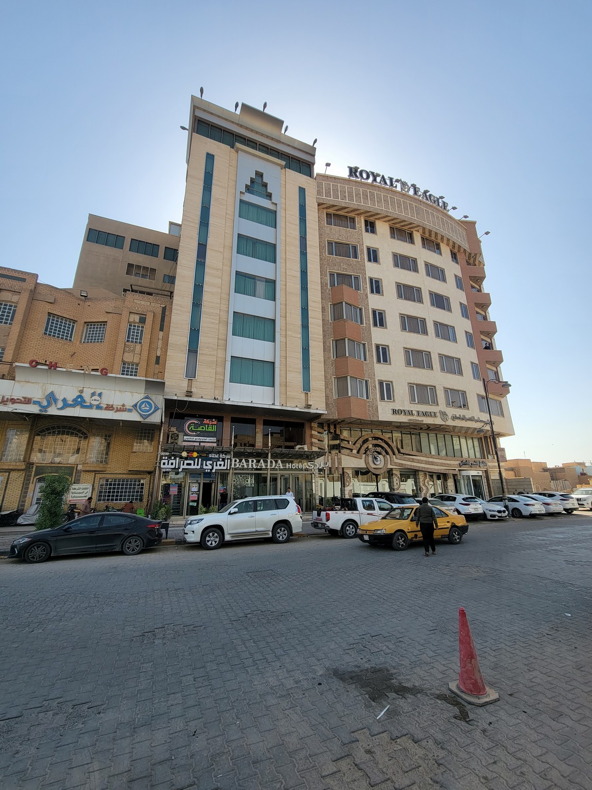 a building with cars parked in front of it