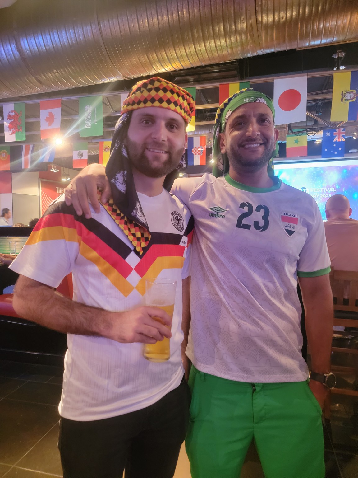 two men posing for a picture