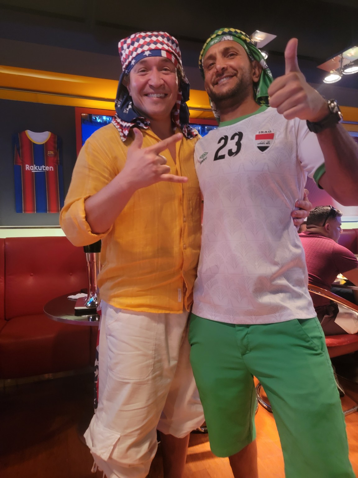 two men posing for a picture