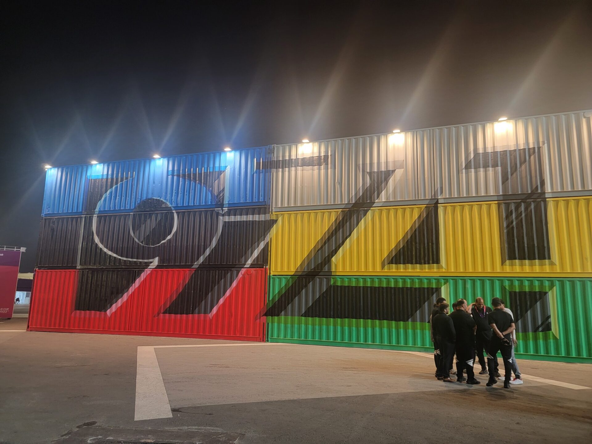 a group of people standing outside of a building