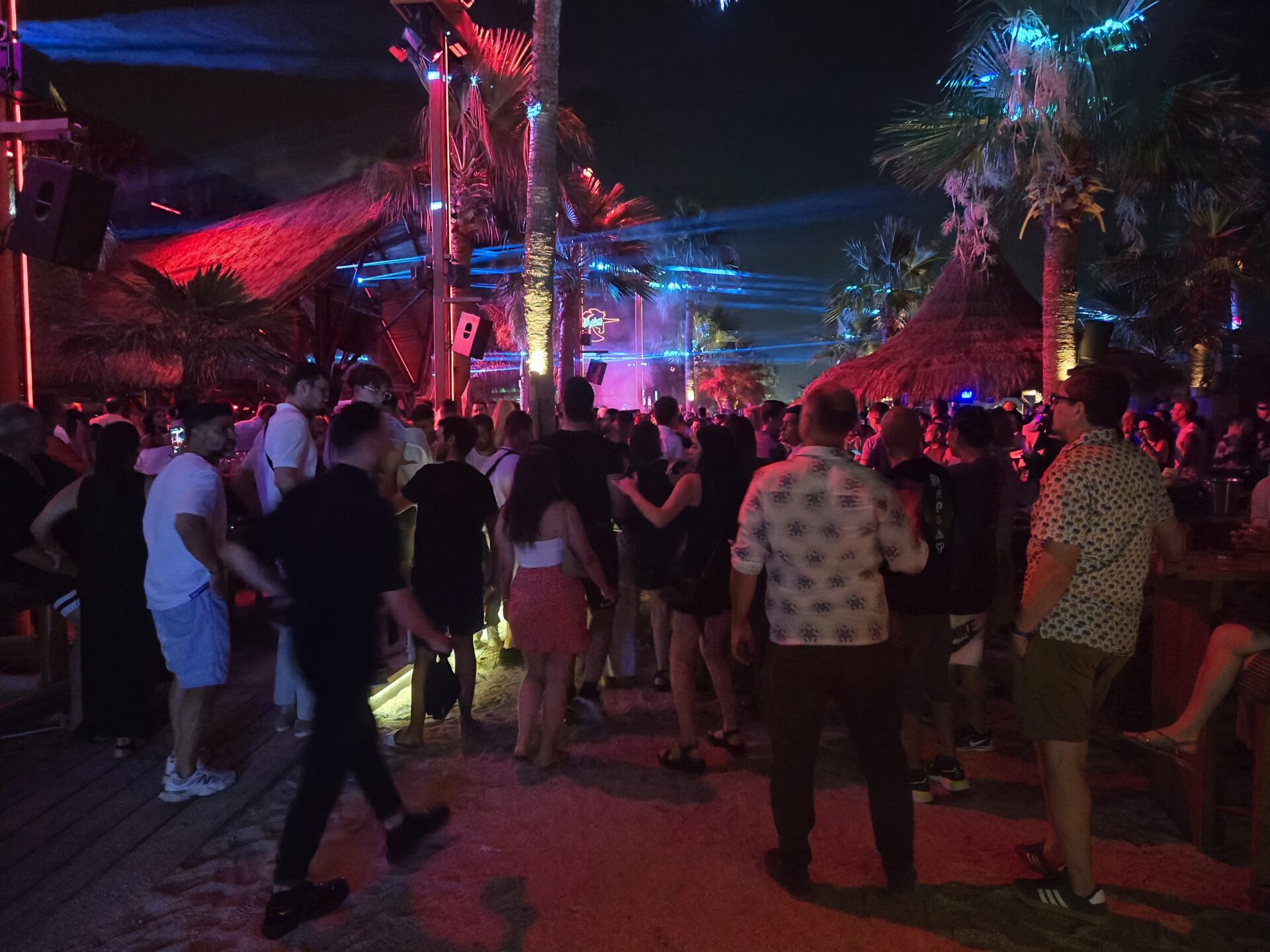 a group of people standing in a crowd