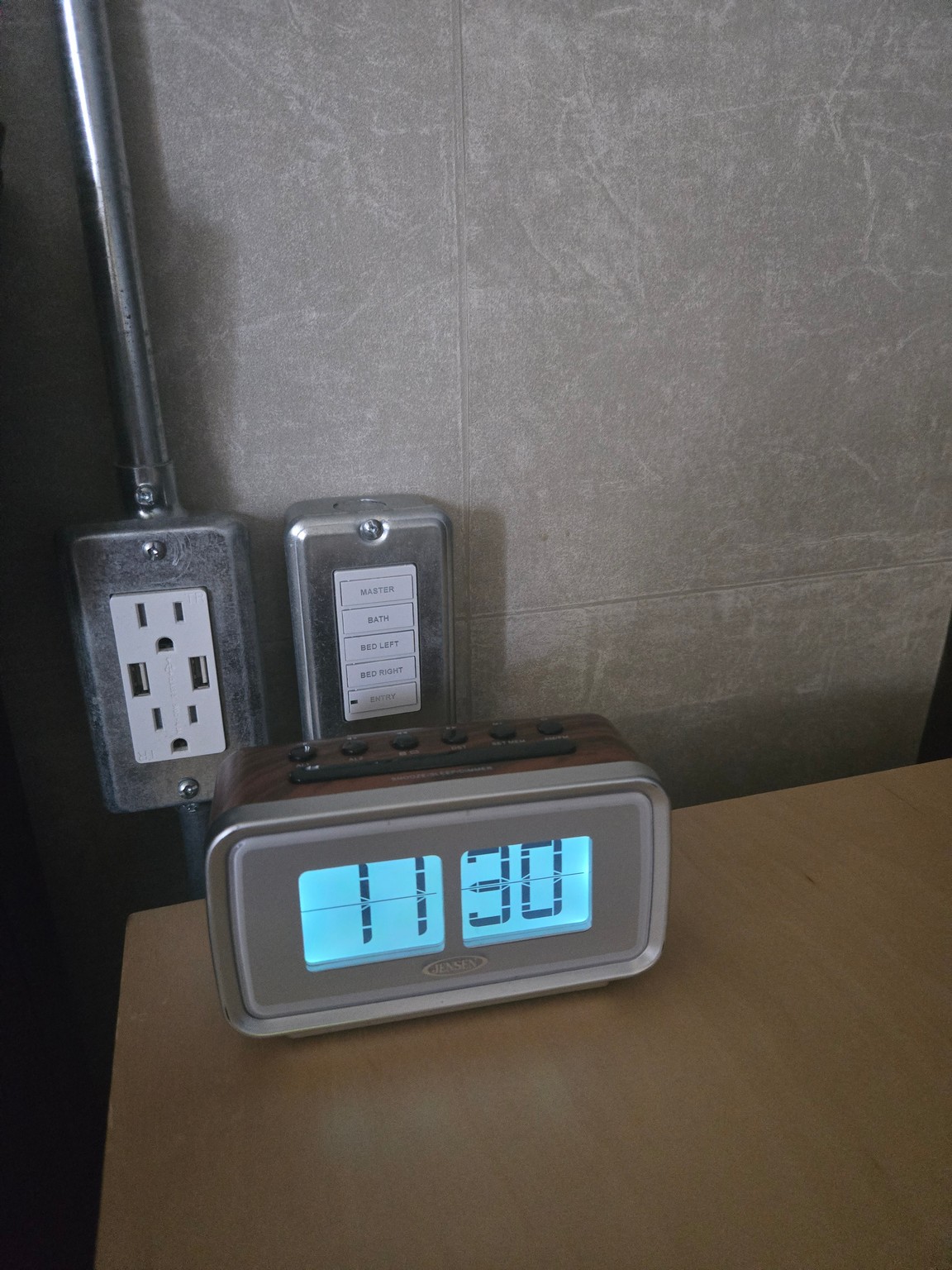 a digital clock on a table