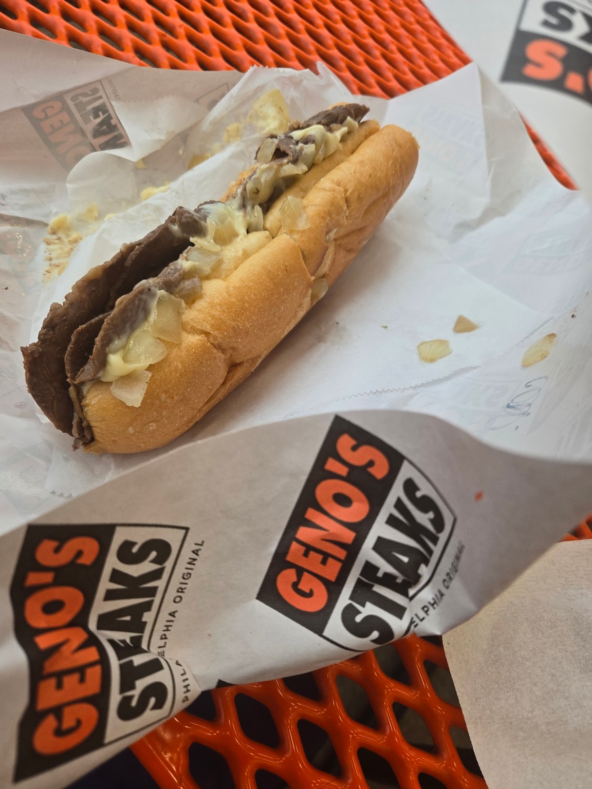 a sandwich on a paper wrapper