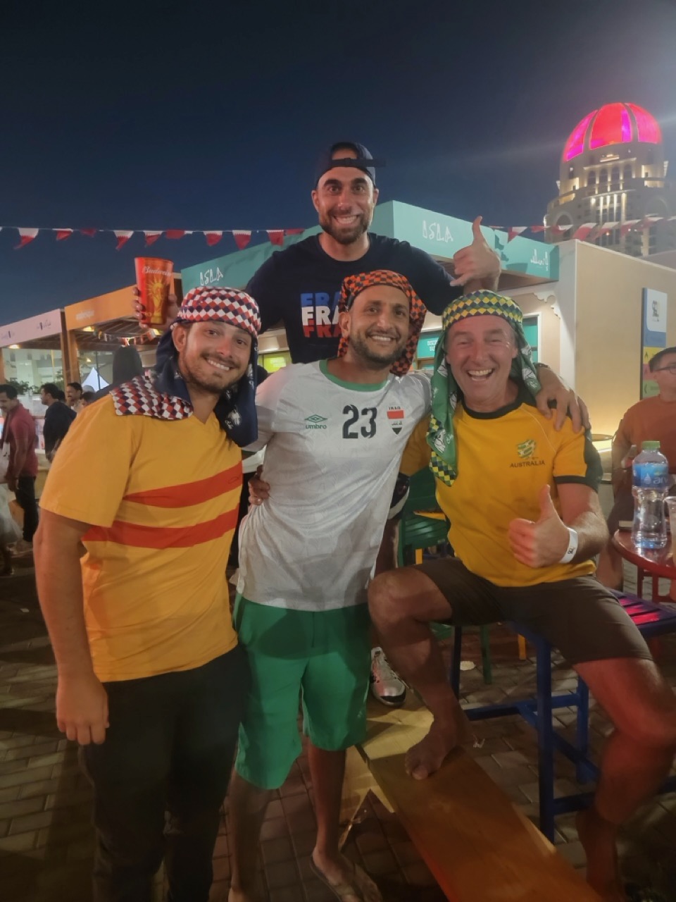 a group of men posing for a picture