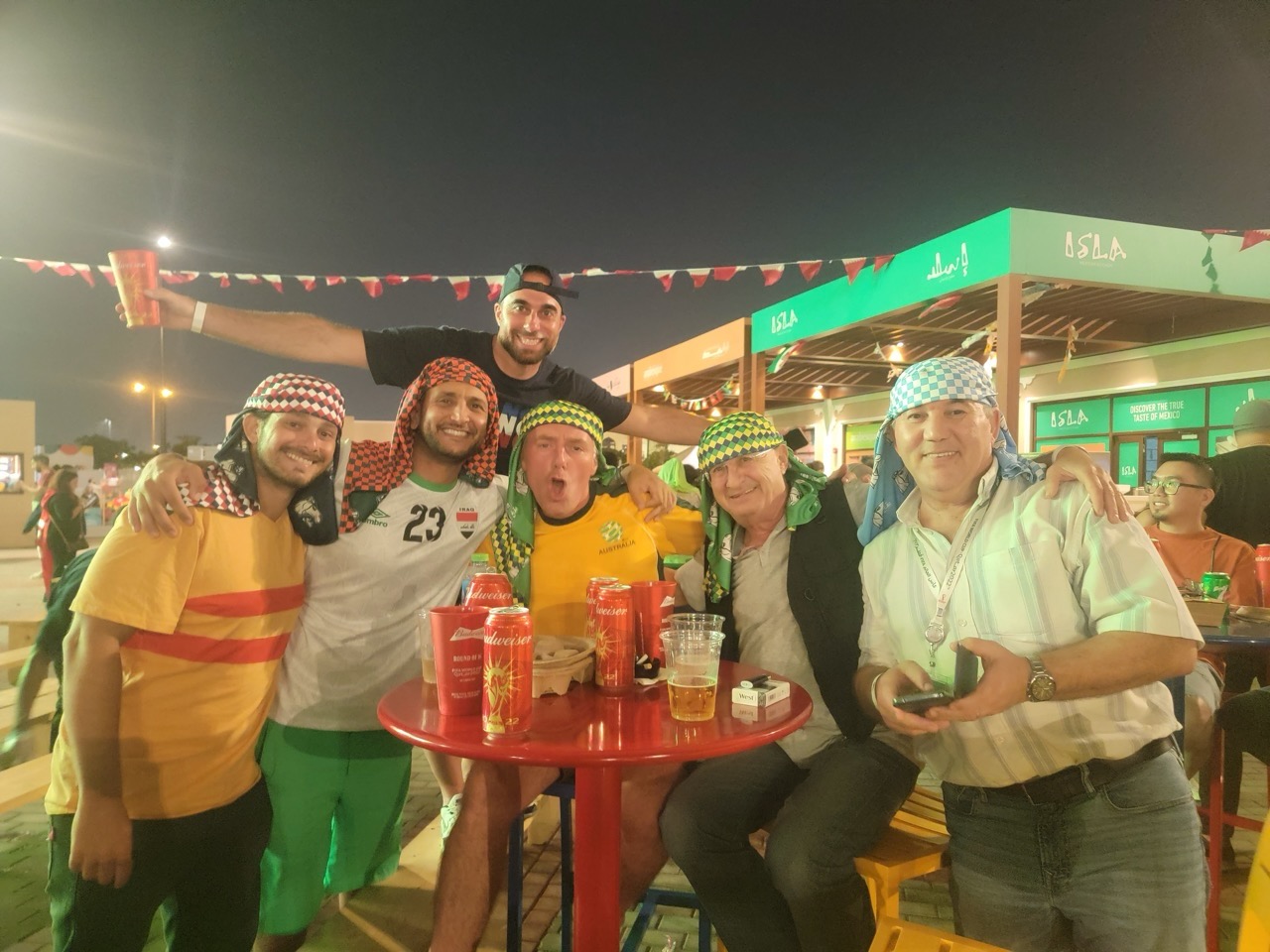 a group of men posing for a picture