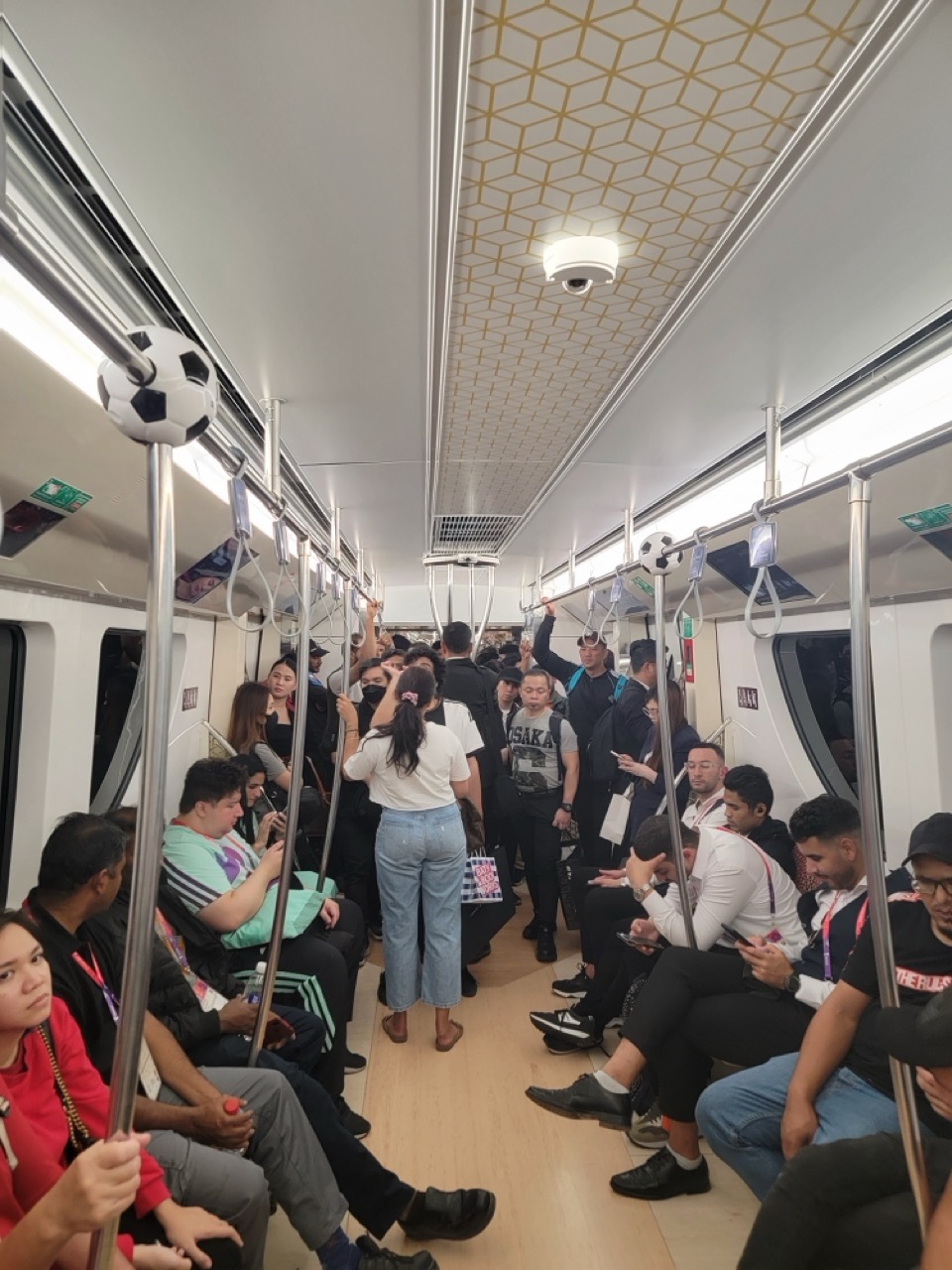 a group of people on a subway
