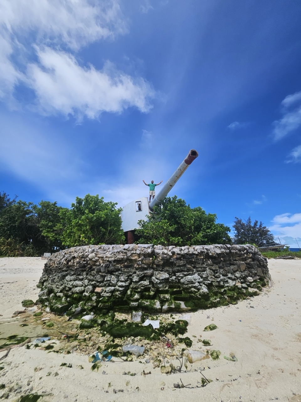 a person standing on a cannon