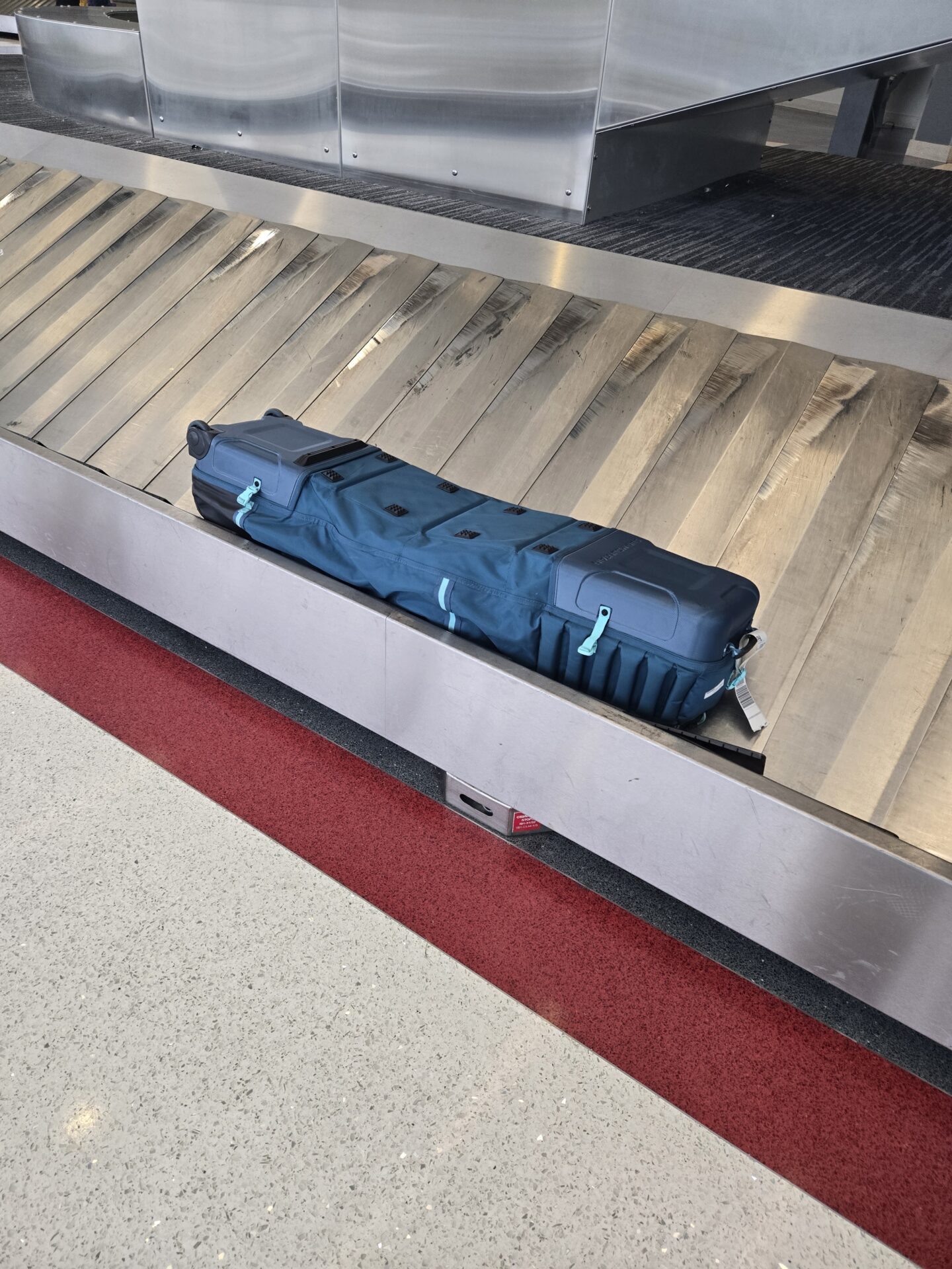 a suitcase on a conveyor belt