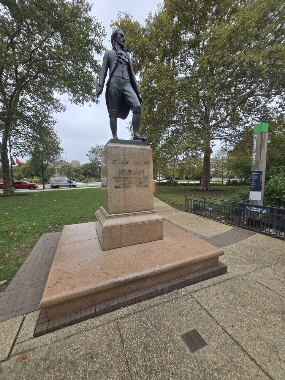 a statue of a man in a park