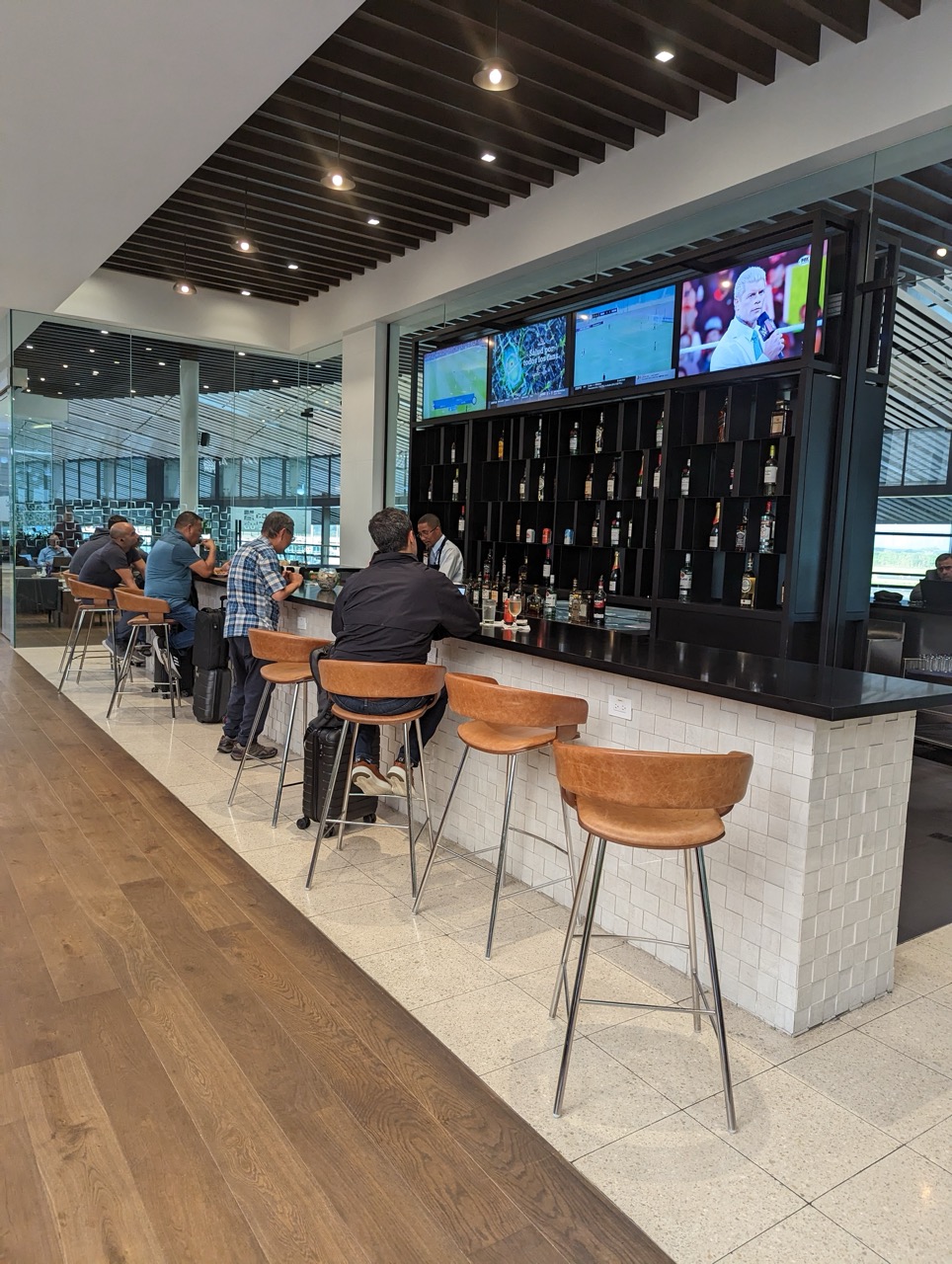 people sitting at a bar