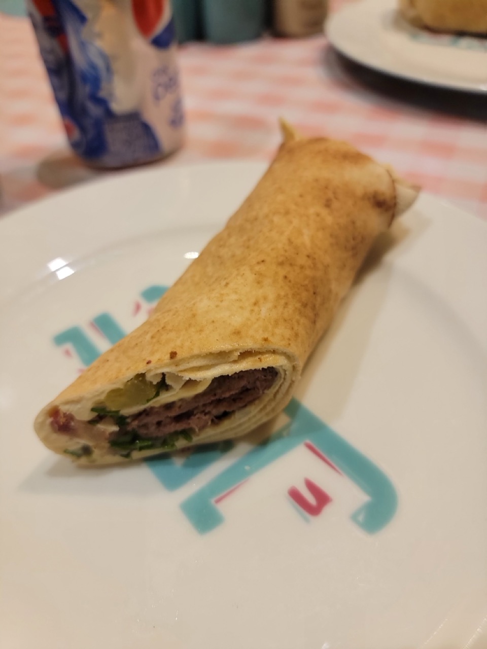 a burrito on a plate