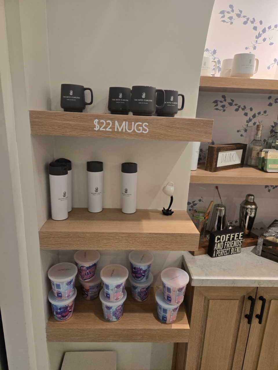 shelves with cups and mugs on it