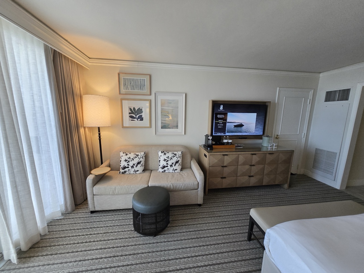 a room with a couch and tv