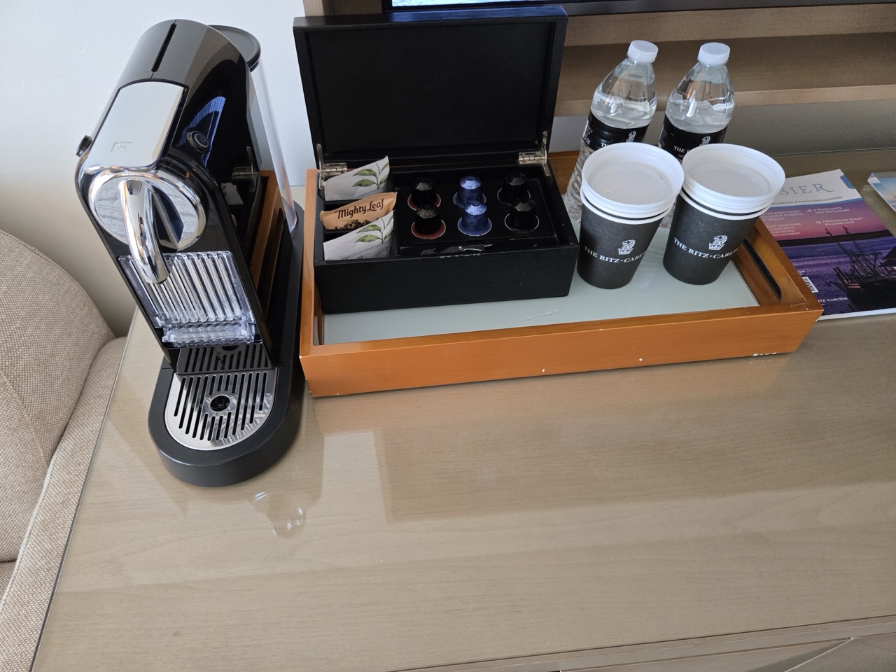 a coffee machine and coffee cups on a table