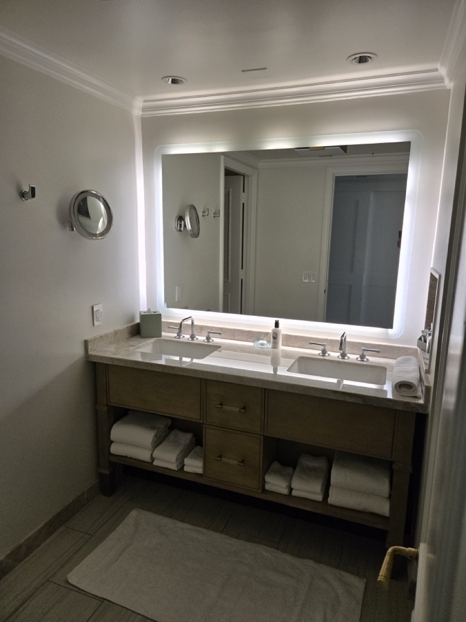 a bathroom with a mirror and sink