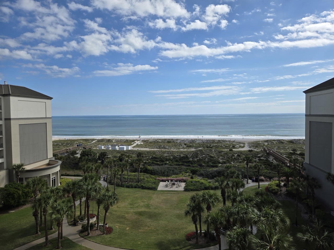 a view of a beach from a balcony